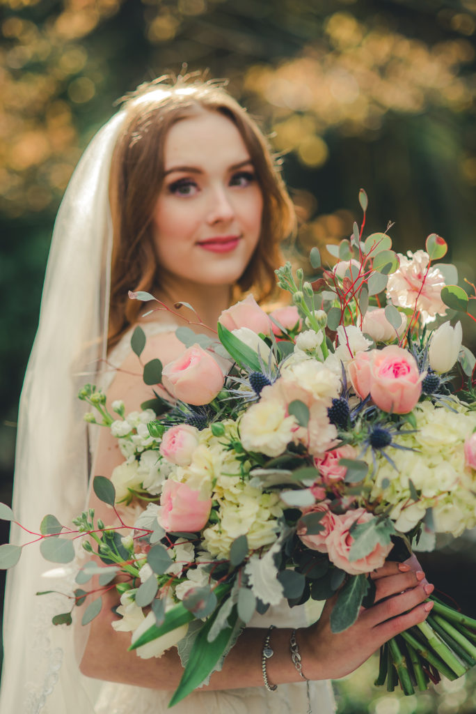 Abernethy center bride with bouquet
