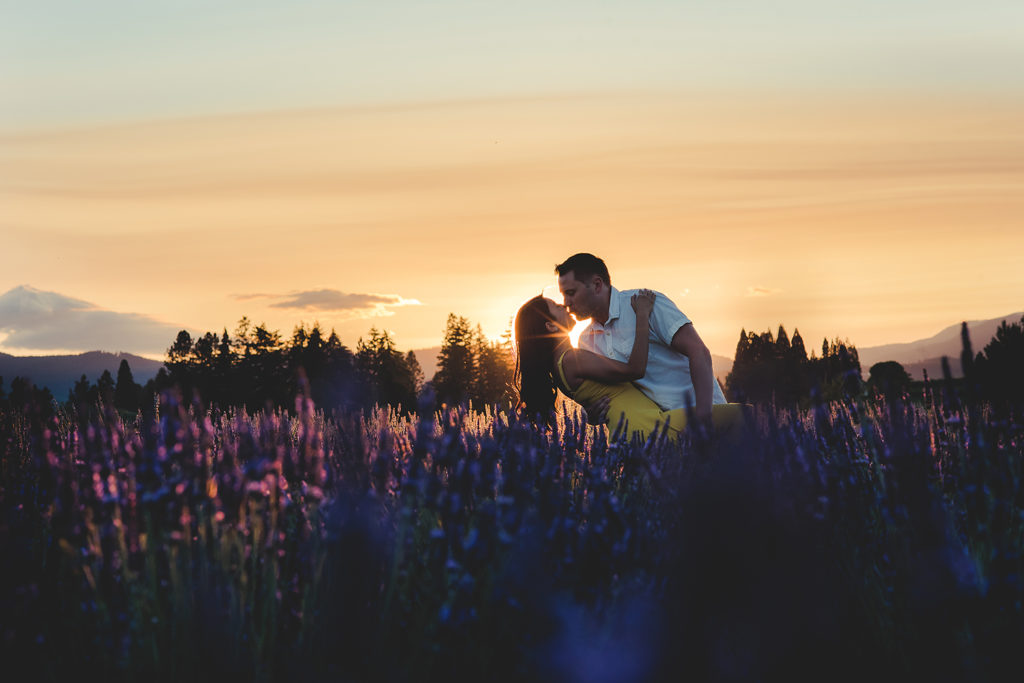 couple kissing in lavender field
